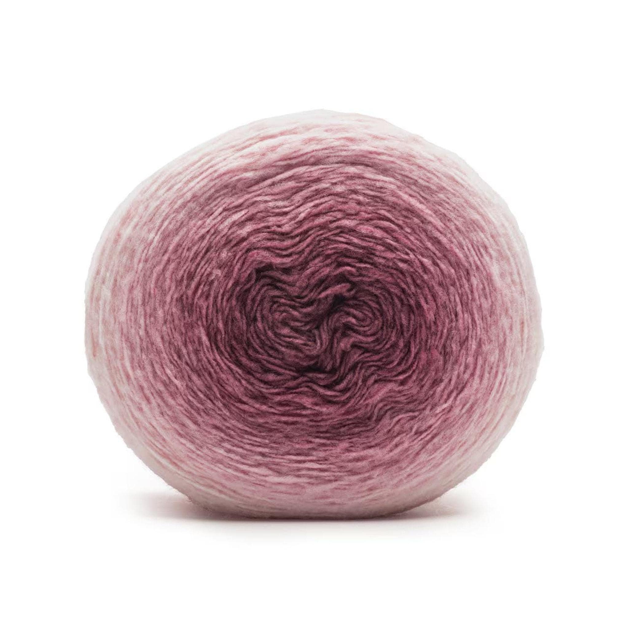 A ball of yarn with a gradient from light pink on the outside to dark rose in the center.