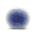 A ball of yarn with a gradient from light blue on the outside to deep blue in the center.