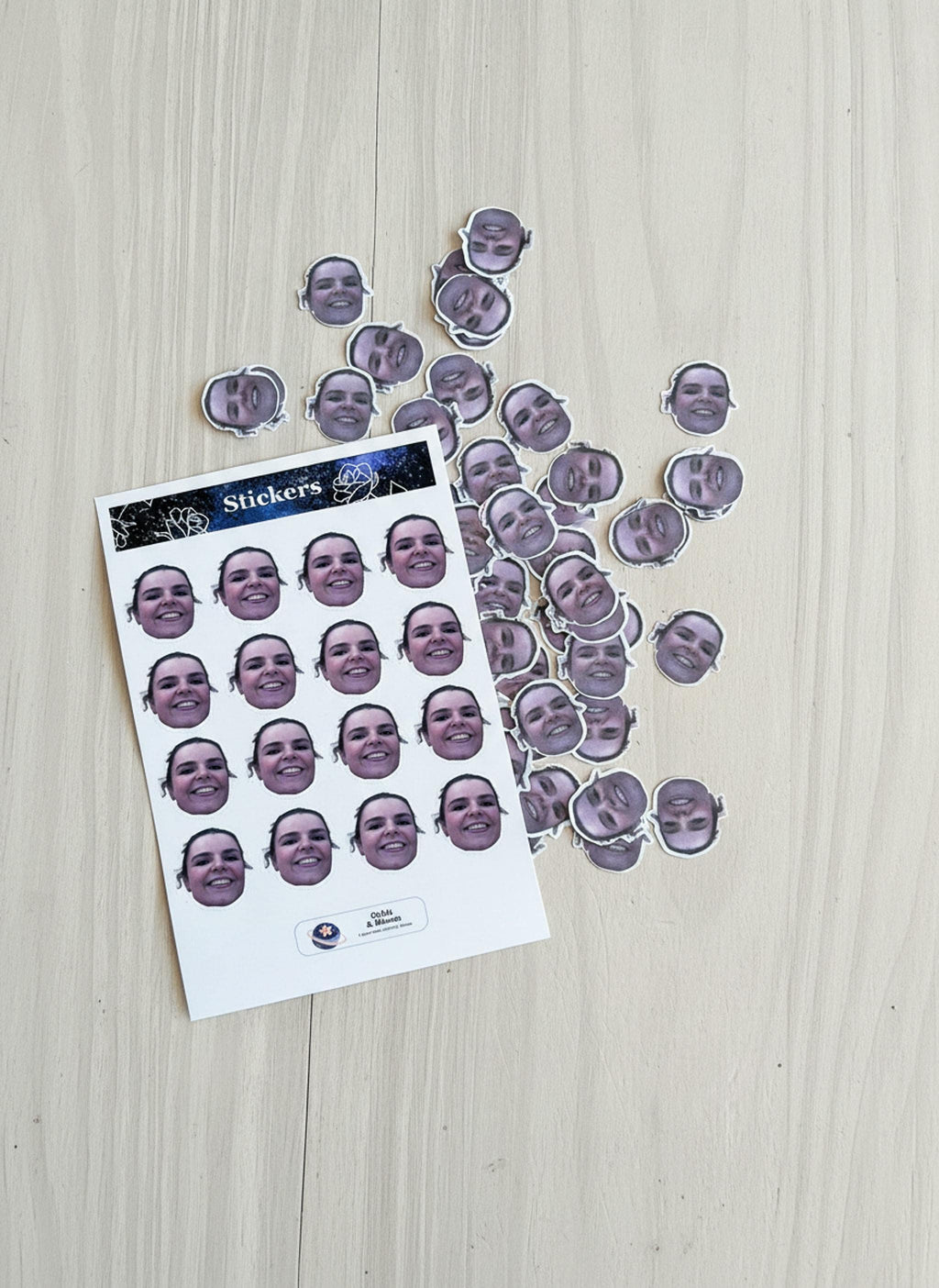 Full sticker sheet and loose face confetti pieces displayed flat.