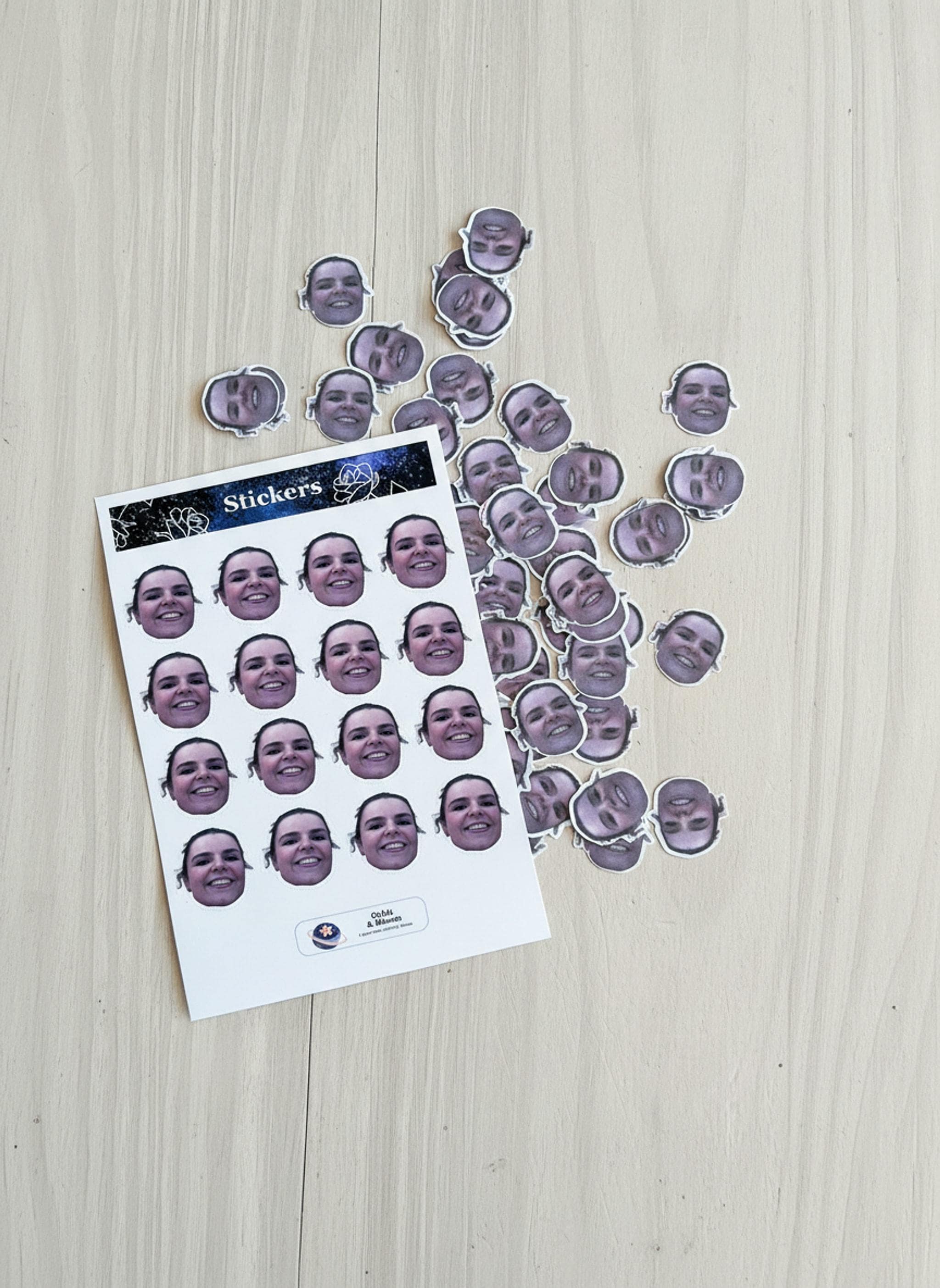 Full sticker sheet and loose face confetti pieces displayed flat.
